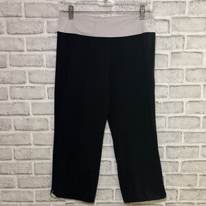 Tuff Athletics lilac, and black Capri leggings size medium